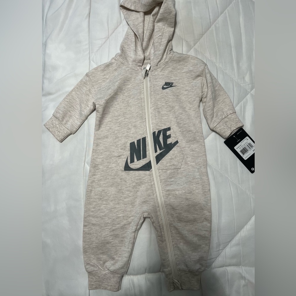 Nike baby pale ivory one piece new with tag size 6m